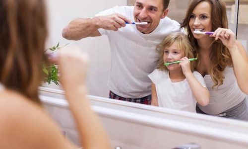 Show them how to brush their teeth properly