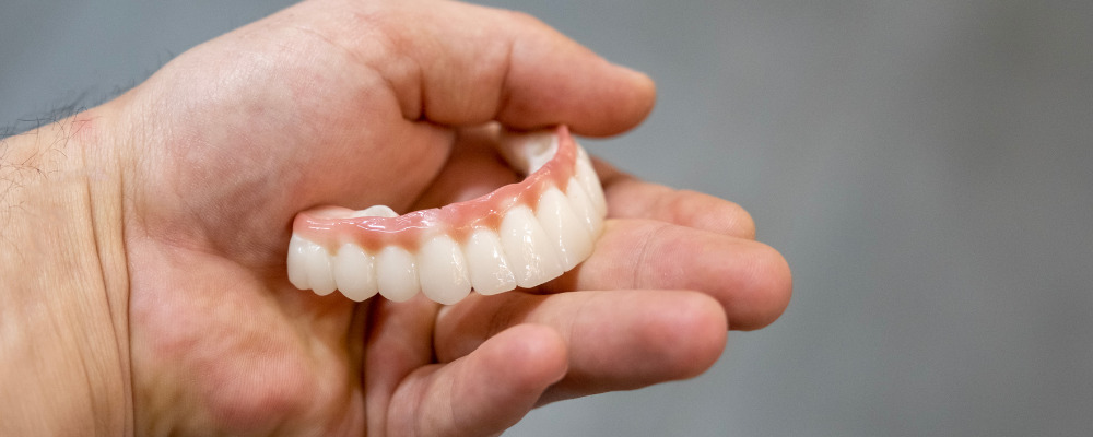 Conventional dentures are removable prosthetic devices designed to replace missing teeth